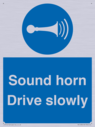 sound-horn-drive-slowly-warehousing-and-delivery-sign~